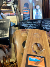 Balancing Wine Holder with Australian penny, with various years available for selection.